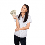 A woman holding a stack of money up to her face representing 5 best same day loans of 2022