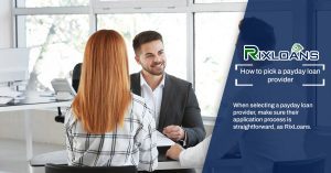 people talking in the office while holding documents