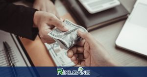 man holding and giving cash to another person