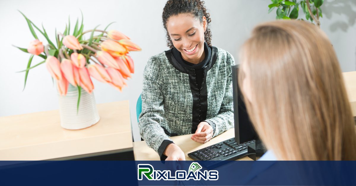 A woman sitting at a desk with a calculator discussing New Jersey payday loans