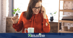 women smiling and talking at the cellphone