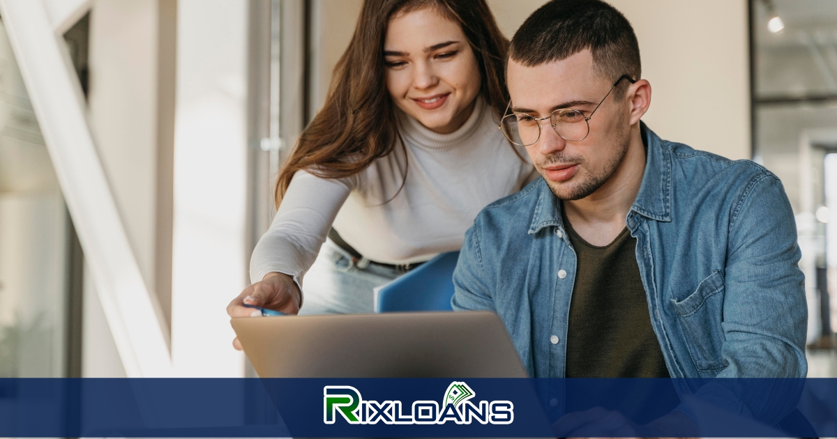 A man and a woman using a laptop to find out how many payday loans they can have in Indiana