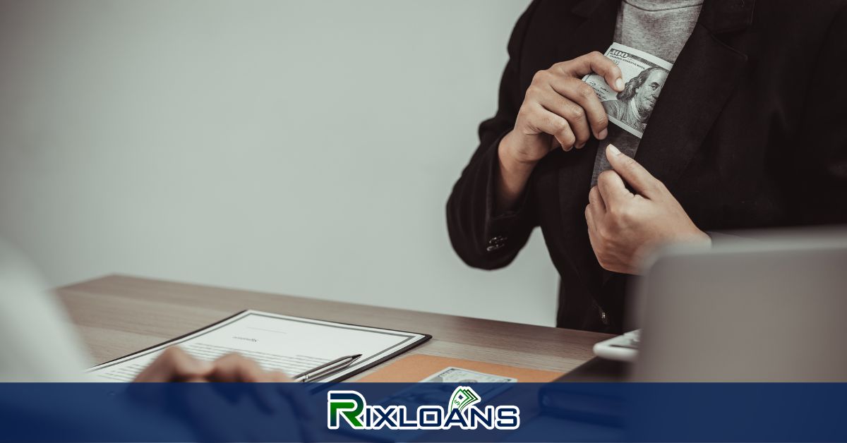 A person sitting at a desk holding money obtained from a payday loan in South carolina