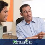 A couple of men sitting next to each other talking about payday loans San Jose