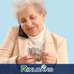 An elderly woman holding a bundle of cash from installment loans Oklahoma